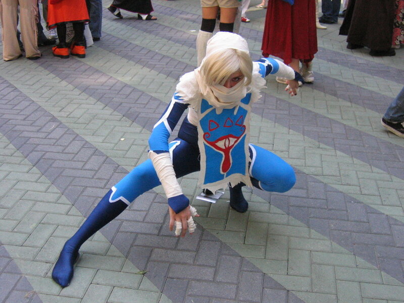cosplayer in blue and white costume
