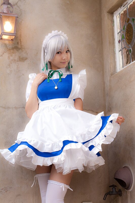 cosplayer in blue and white dress