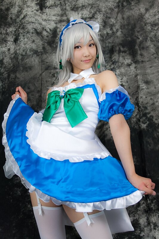 cosplayer in blue and white dress