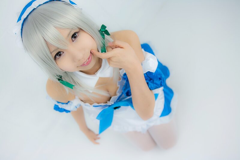 cosplayer in blue and white dress