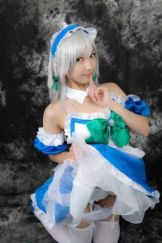 cosplayer in blue and white dress