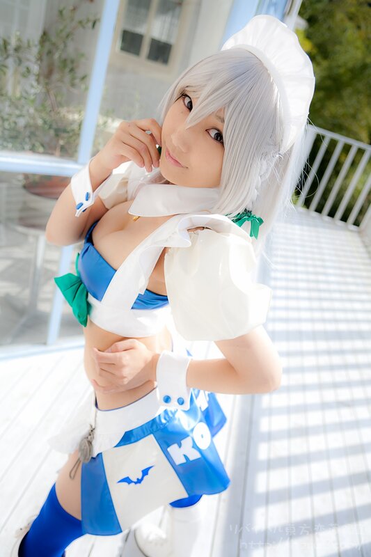 cosplayer in blue and white outfit