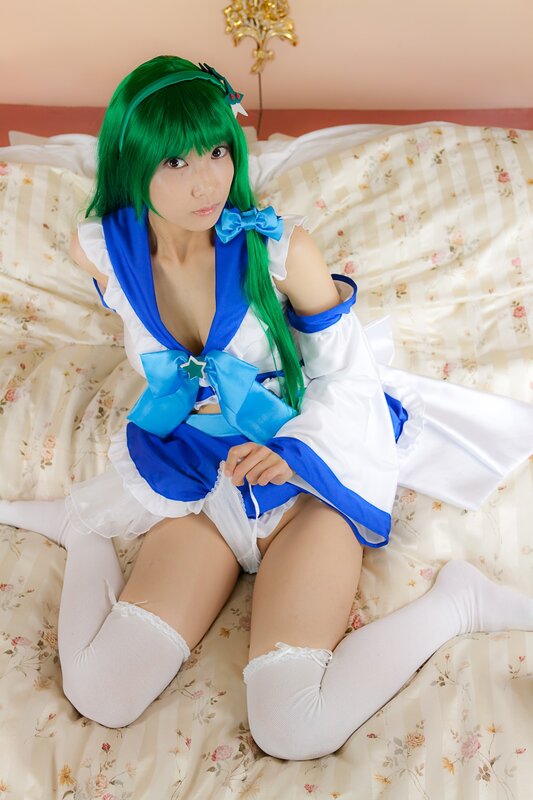 cosplayer in blue and white outfit