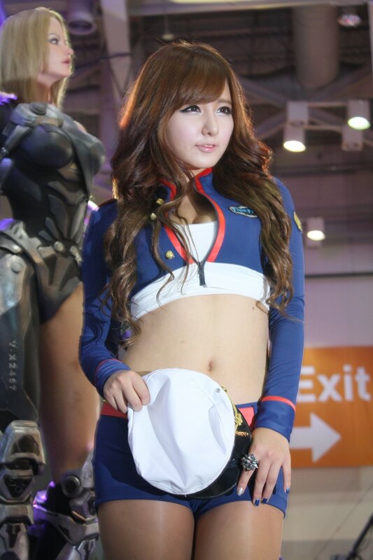 cosplayer in blue and white outfit