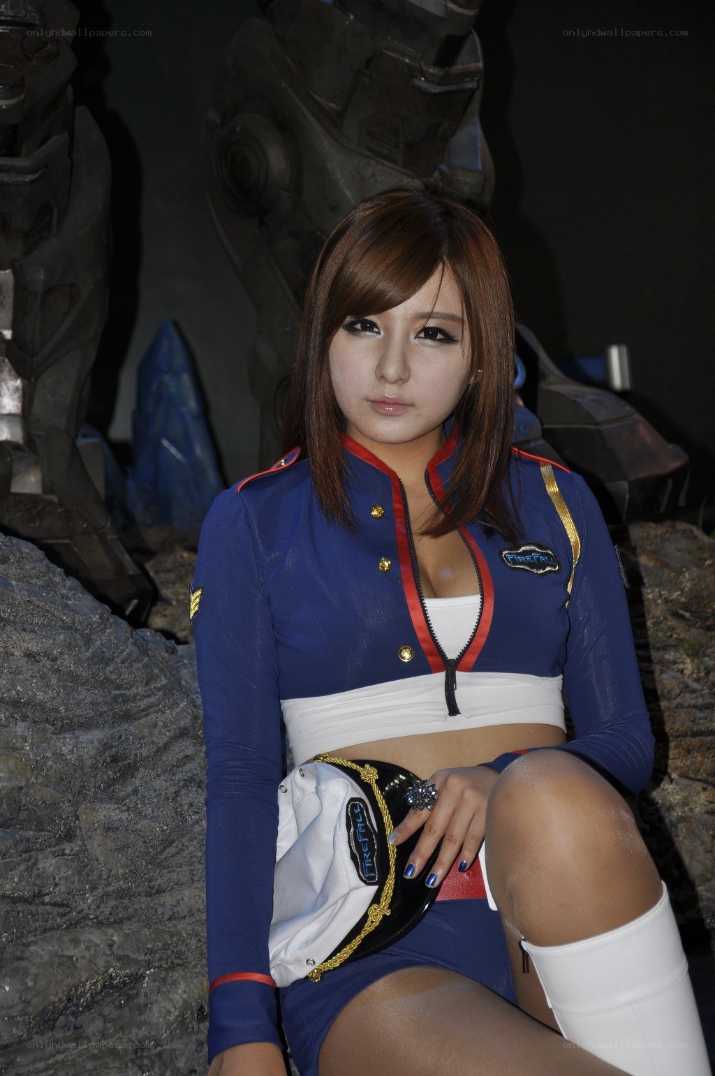 cosplayer in blue and white uniform