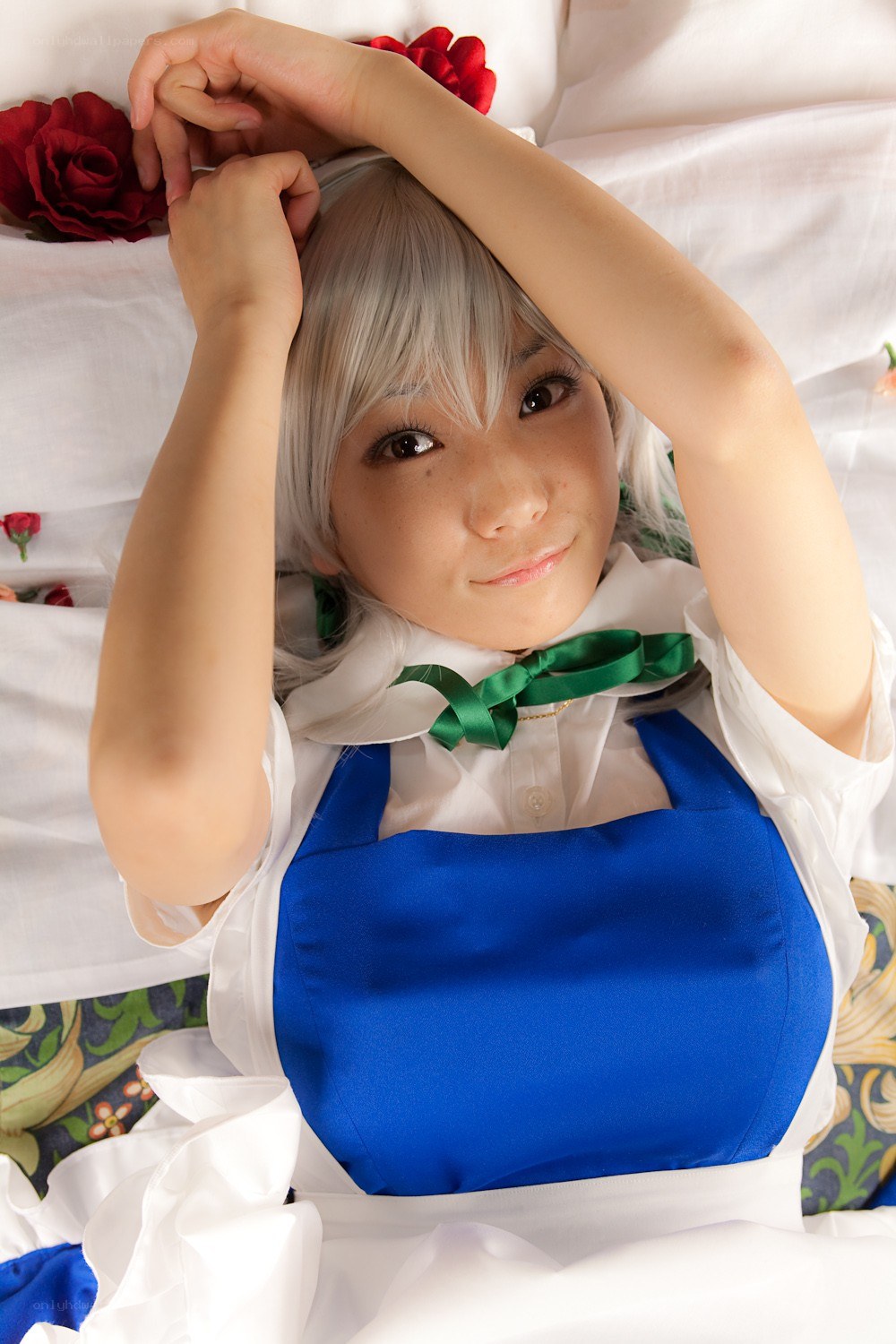 cosplayer in blue apron
