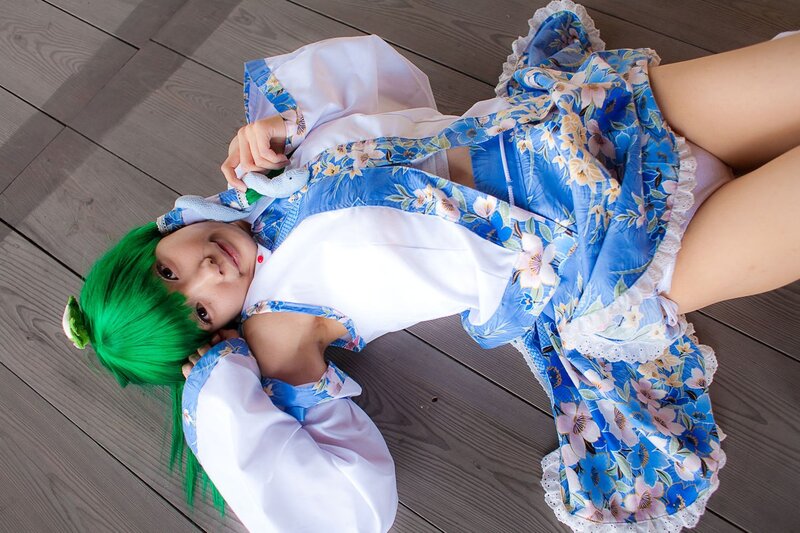cosplayer in blue floral outfit