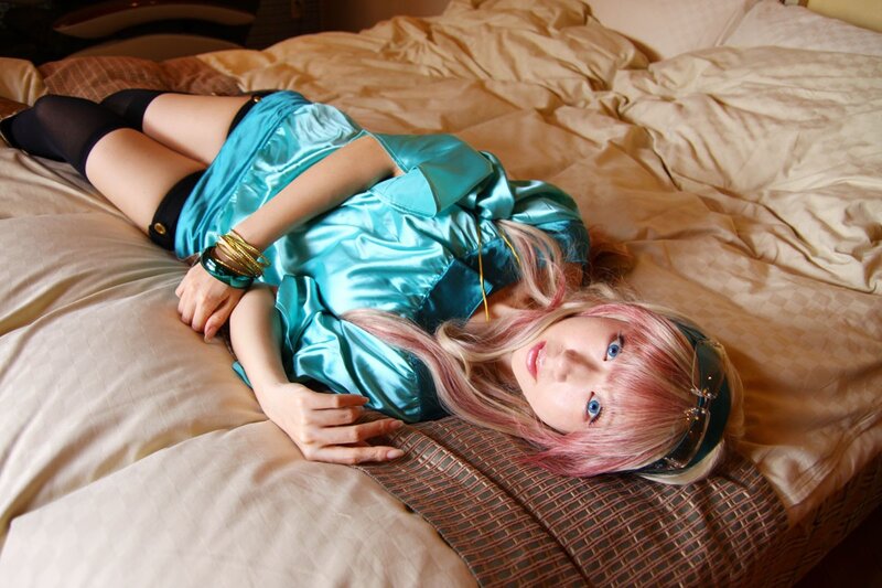 cosplayer in blue satin dress