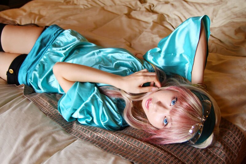 cosplayer in blue satin dress