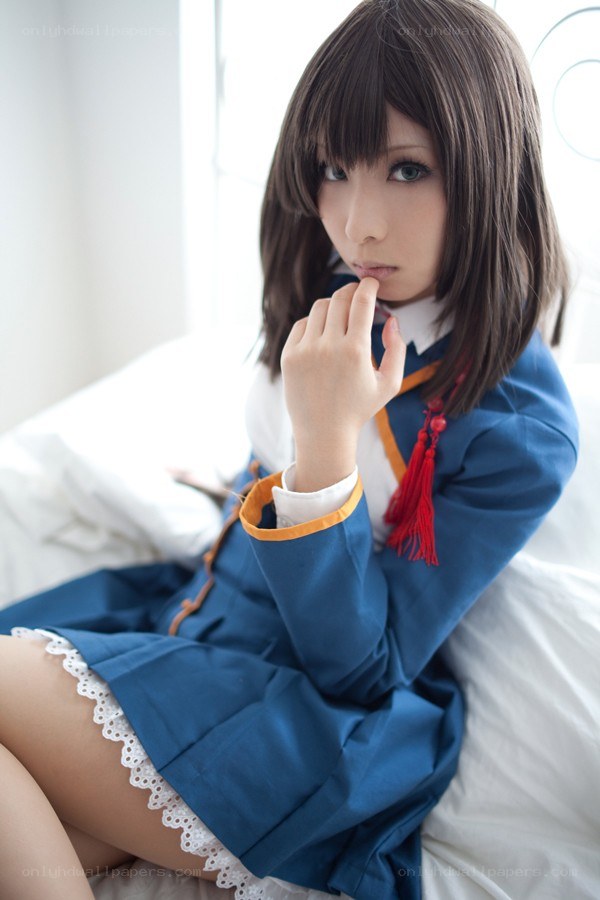 cosplayer in blue school uniform