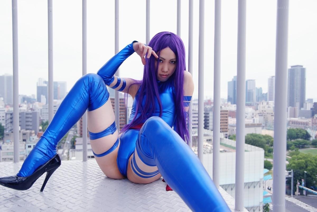 cosplayer in blue suit on rooftop
