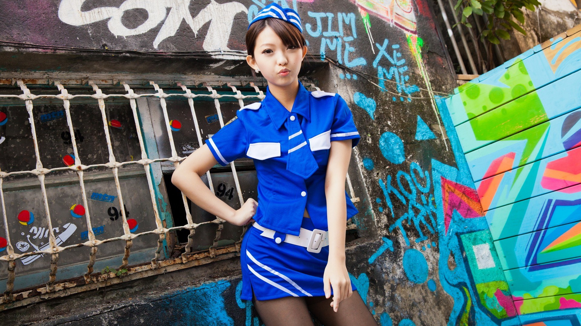 cosplayer in blue uniform