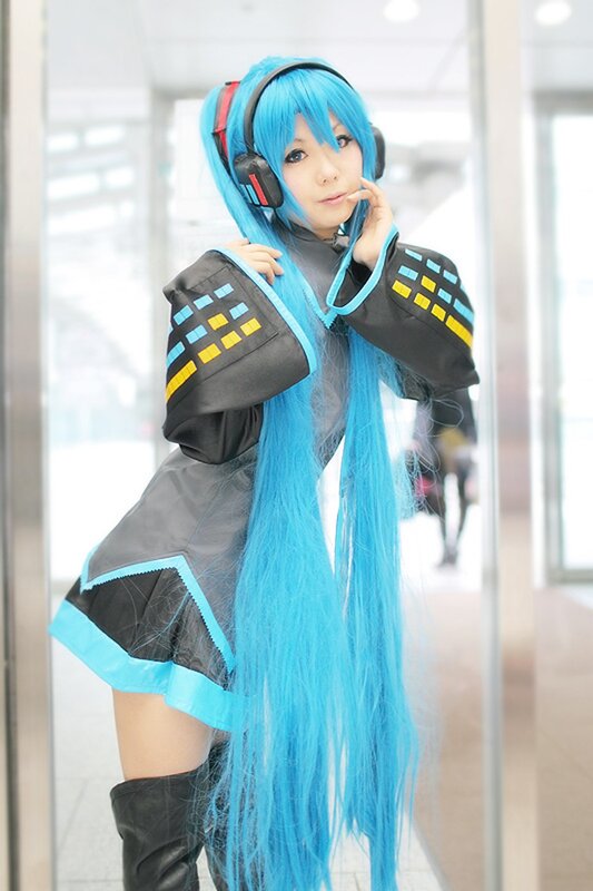 cosplayer in blue wig and headphones