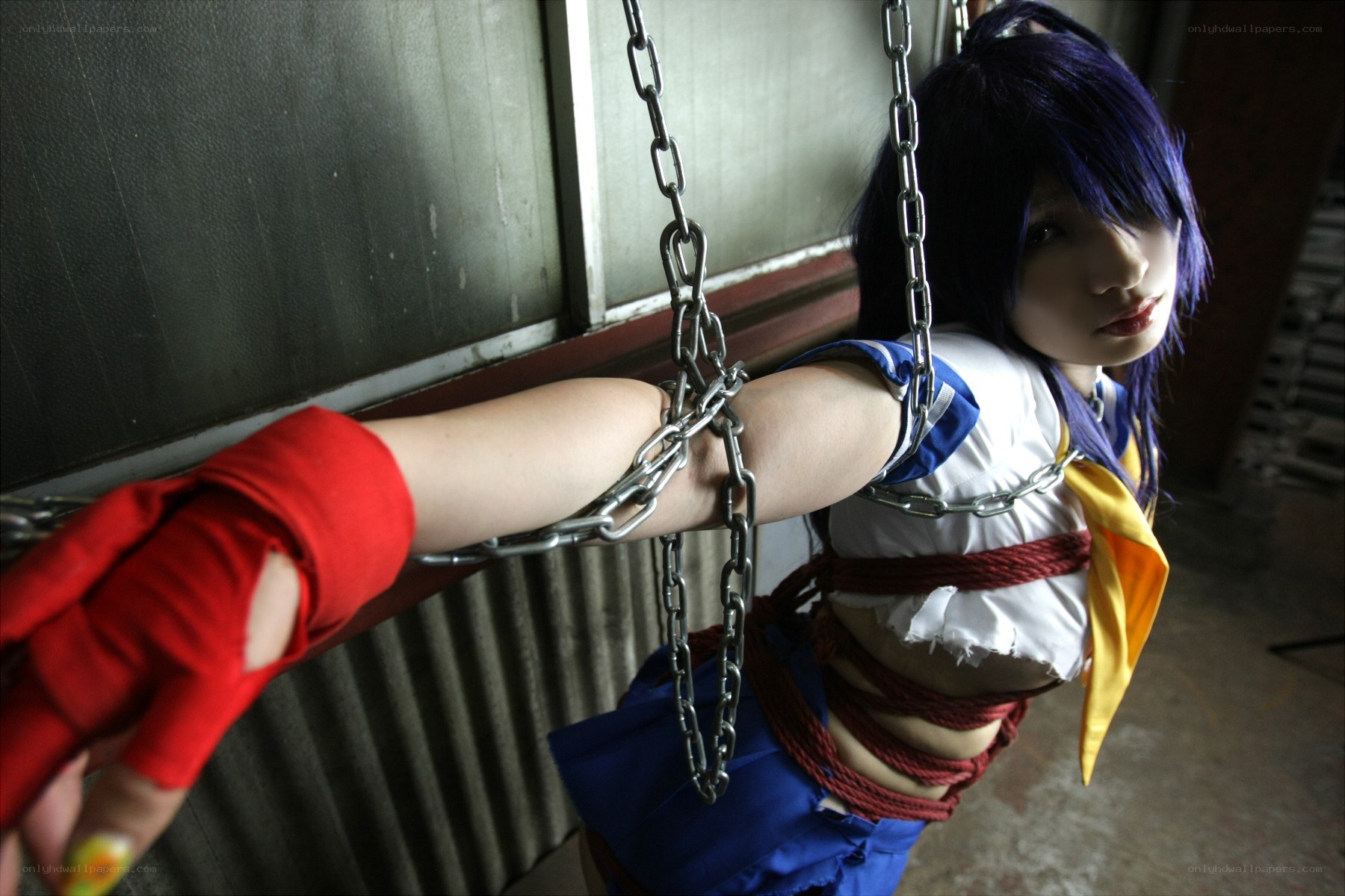 cosplayer in bondage pose