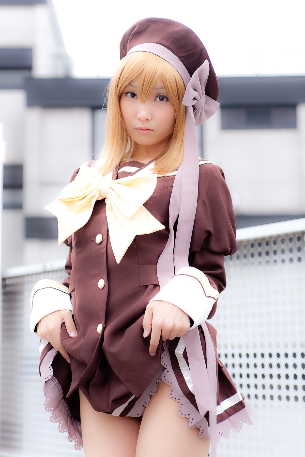 cosplayer in brown outfit