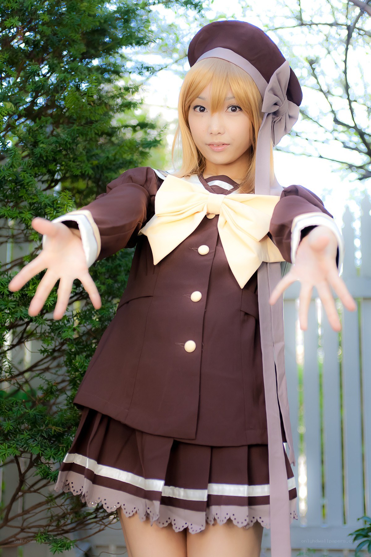 cosplayer in brown school uniform