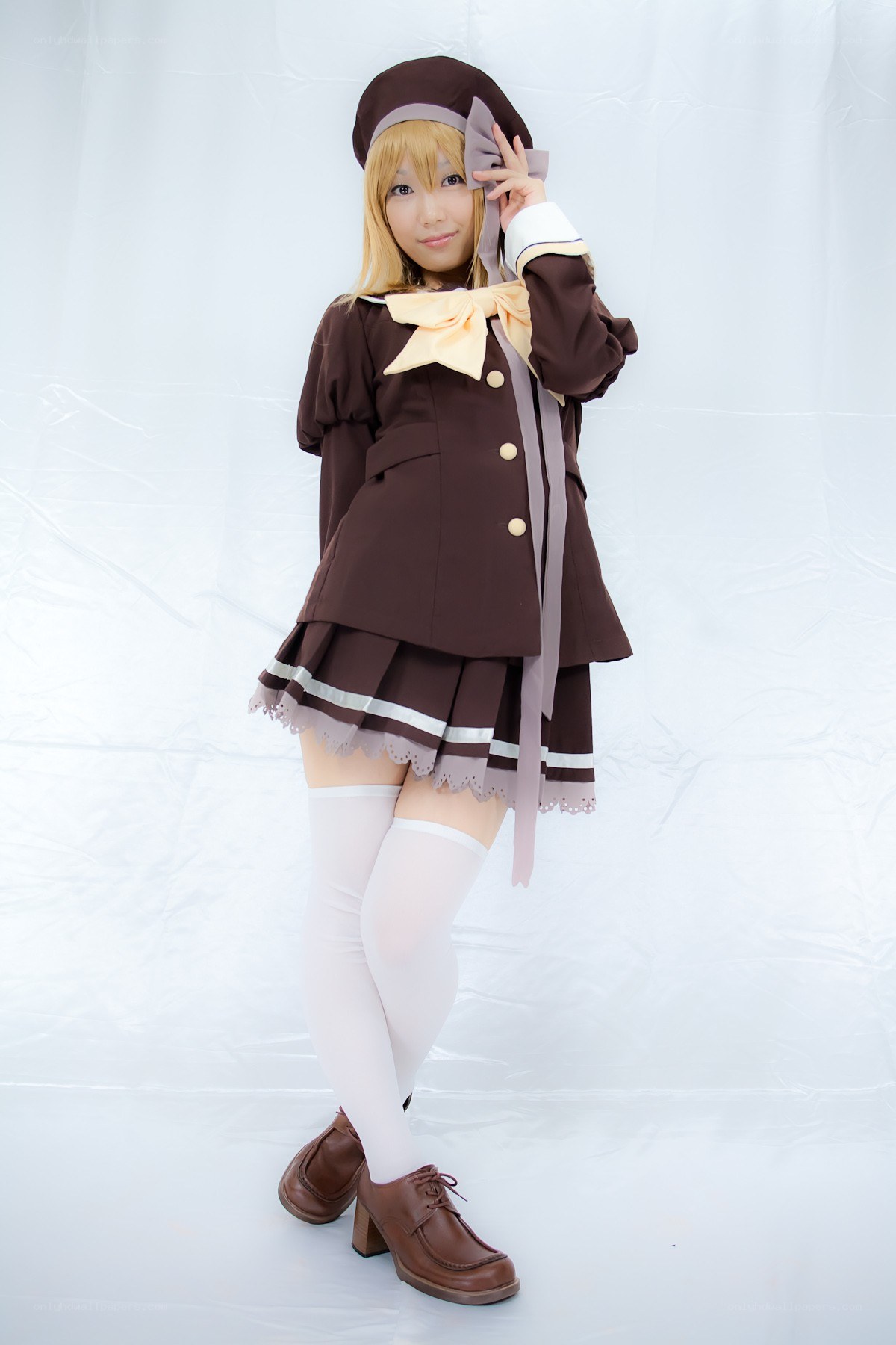 cosplayer in brown school uniform