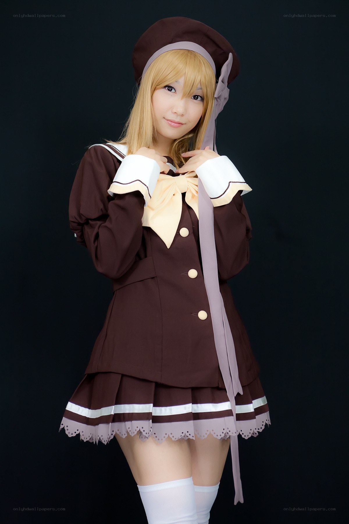 cosplayer in brown uniform