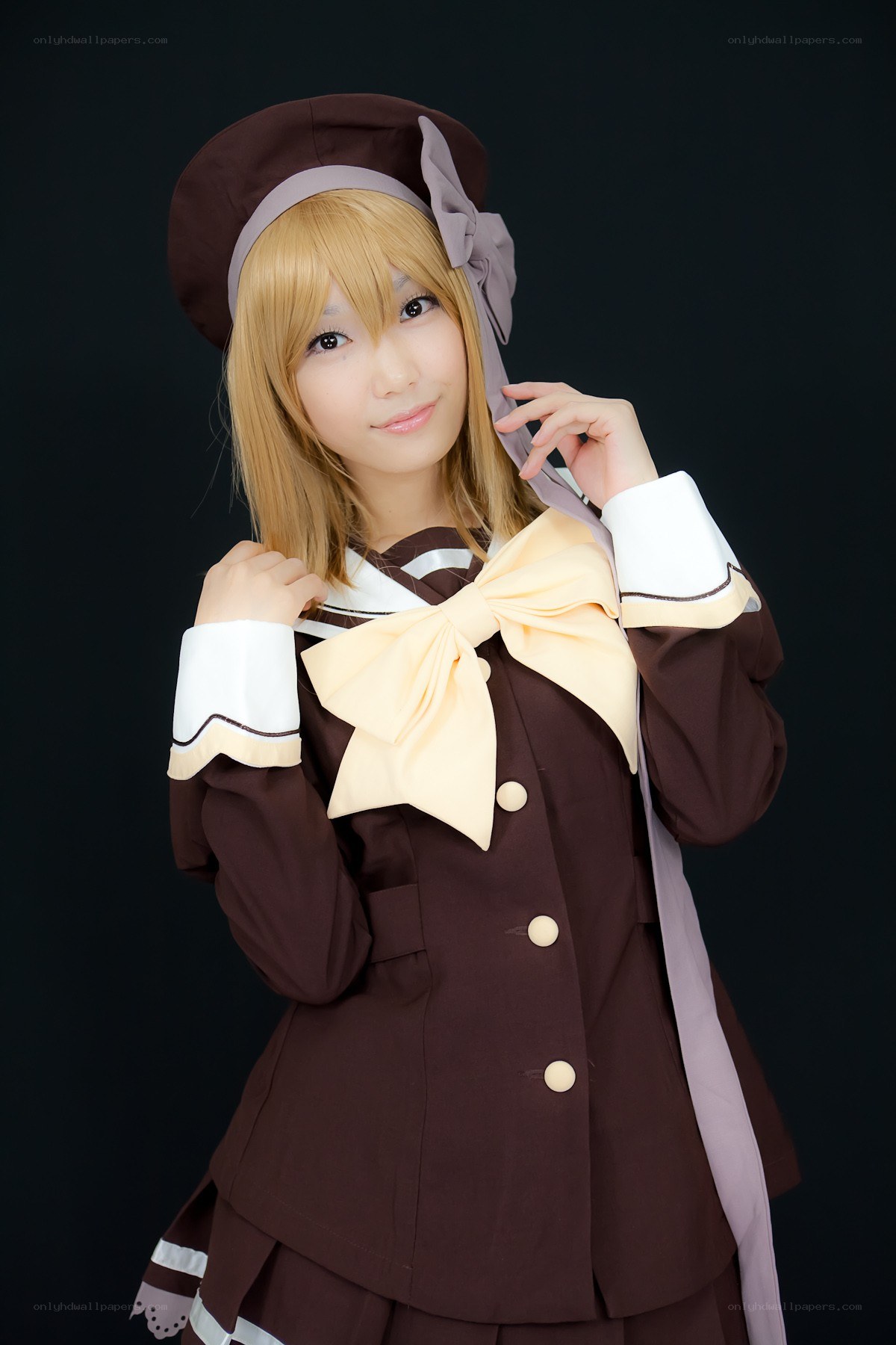 cosplayer in brown uniform