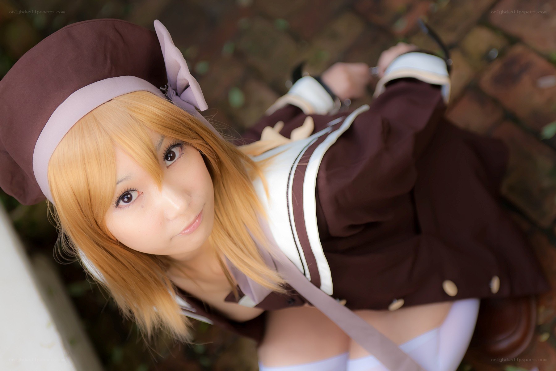 cosplayer in brown uniform