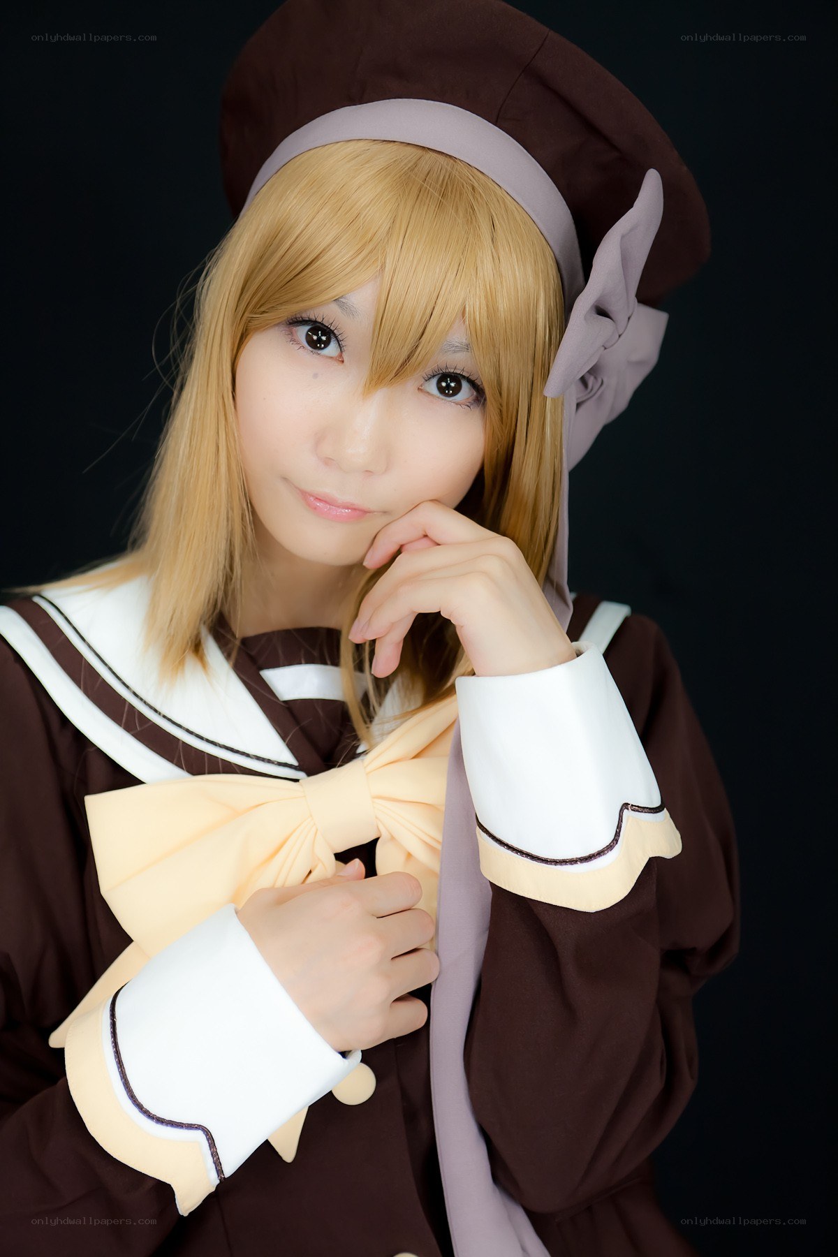 cosplayer in brown uniform