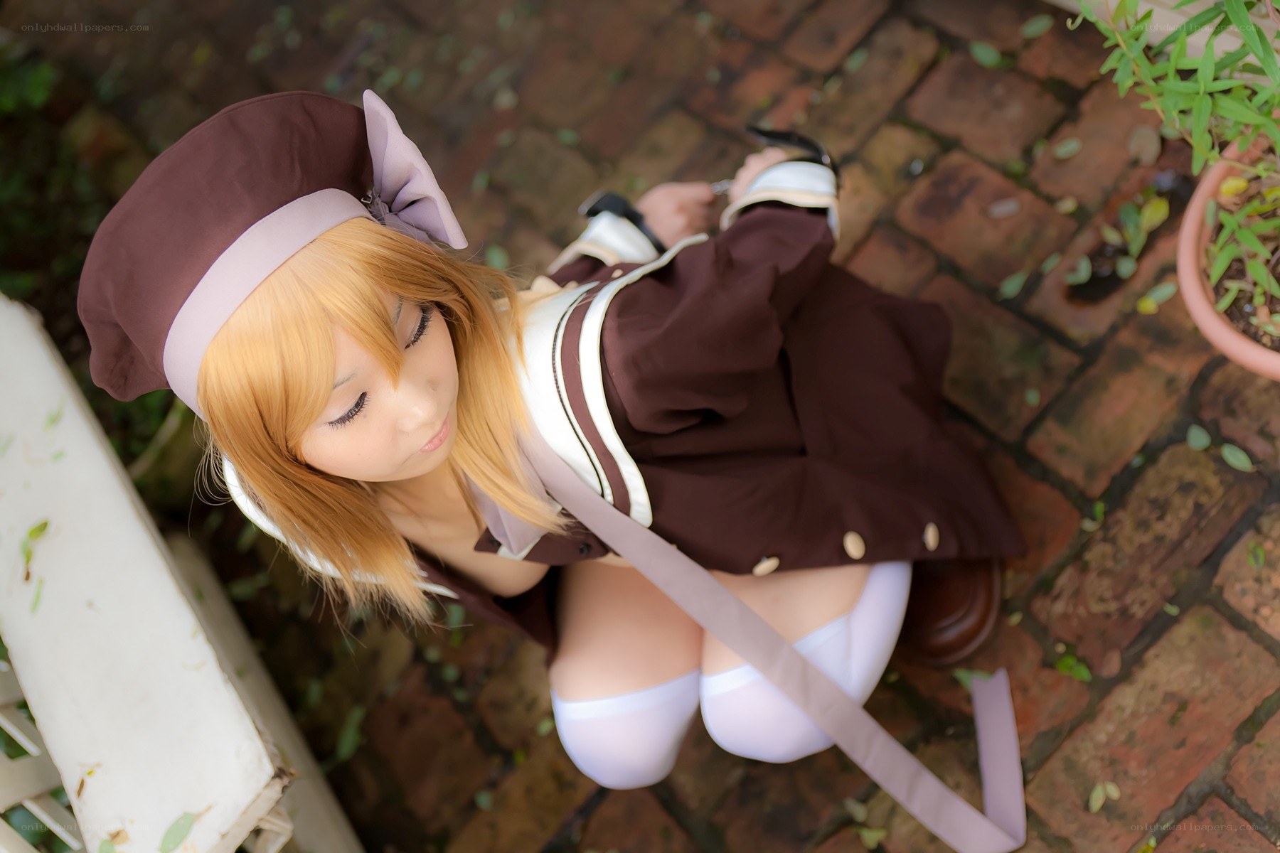 cosplayer in brown uniform