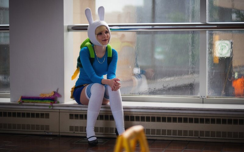 cosplayer in bunny hat by window