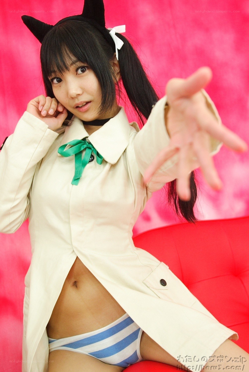 cosplayer in cat ears and coat