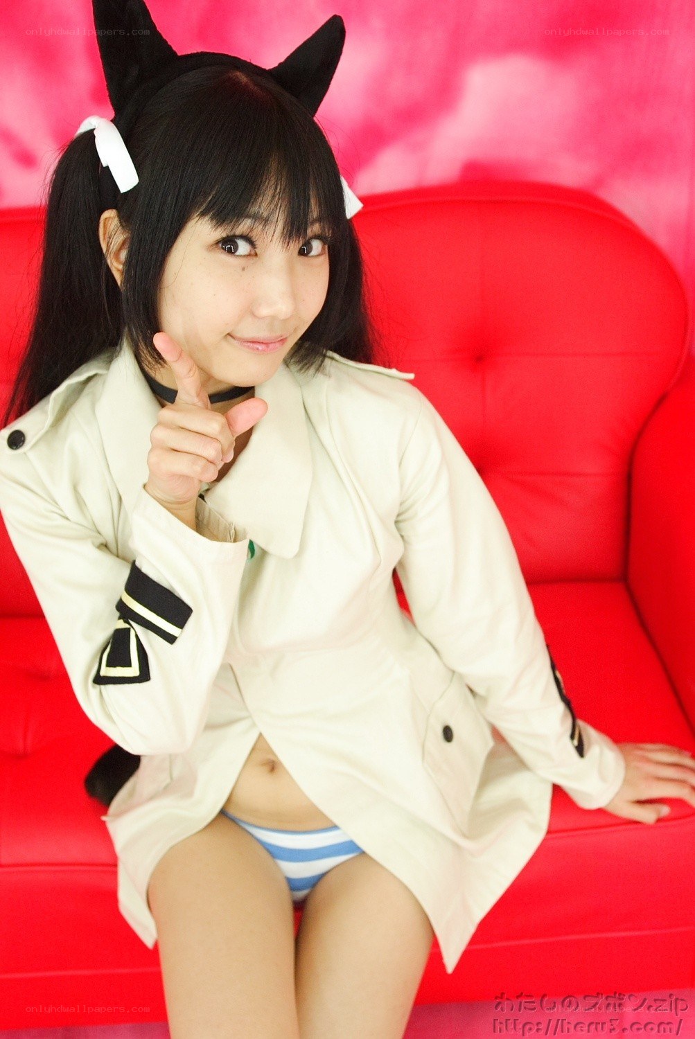 cosplayer in cat ears and coat
