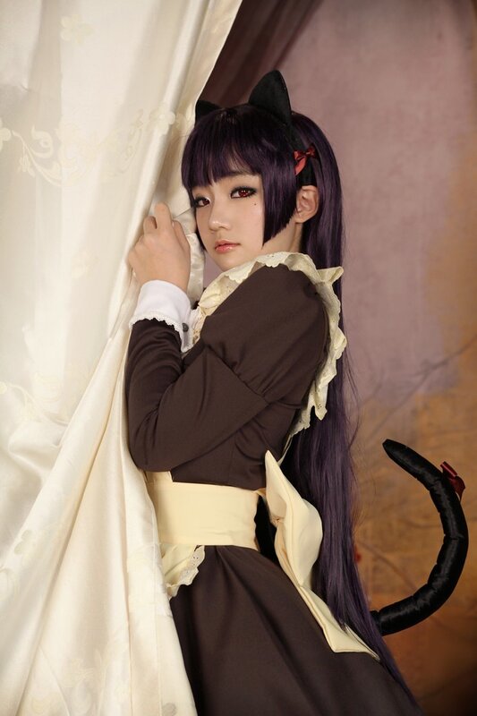 cosplayer in cat-themed dress