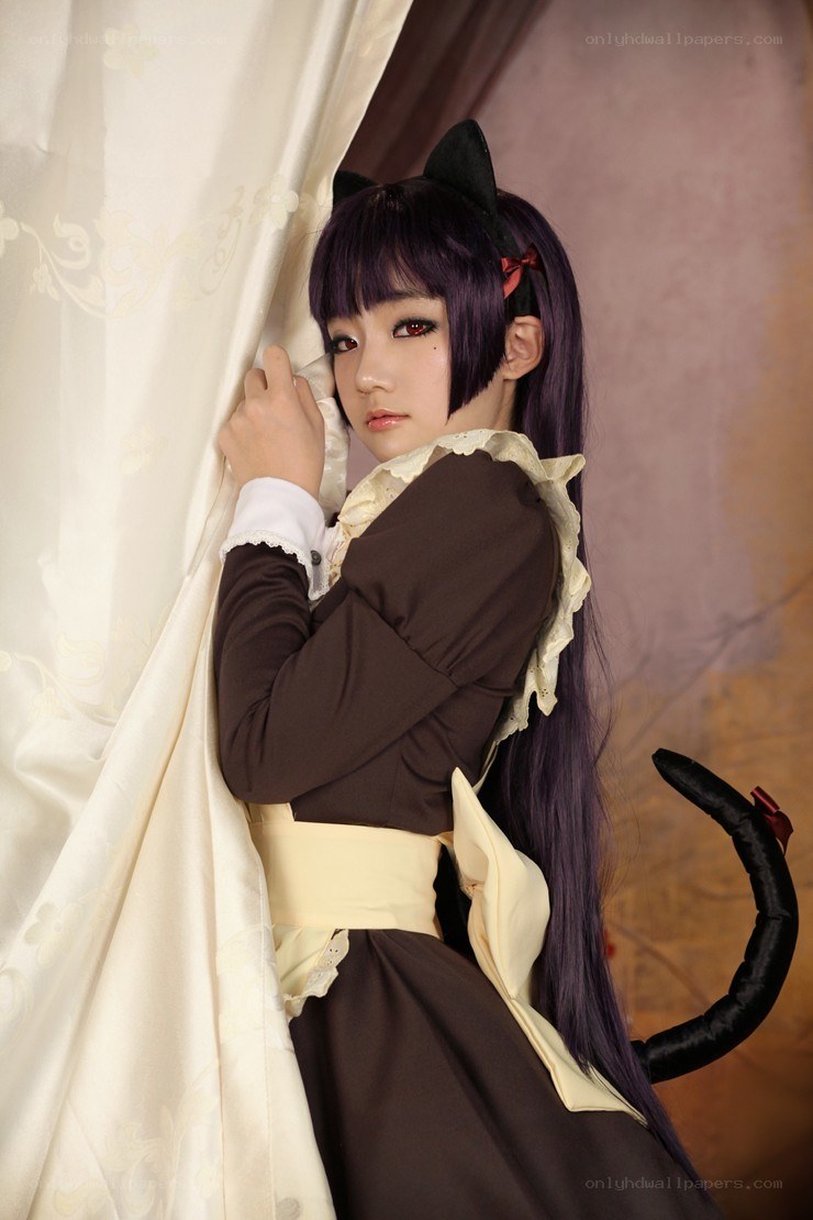 cosplayer in cat-themed dress
