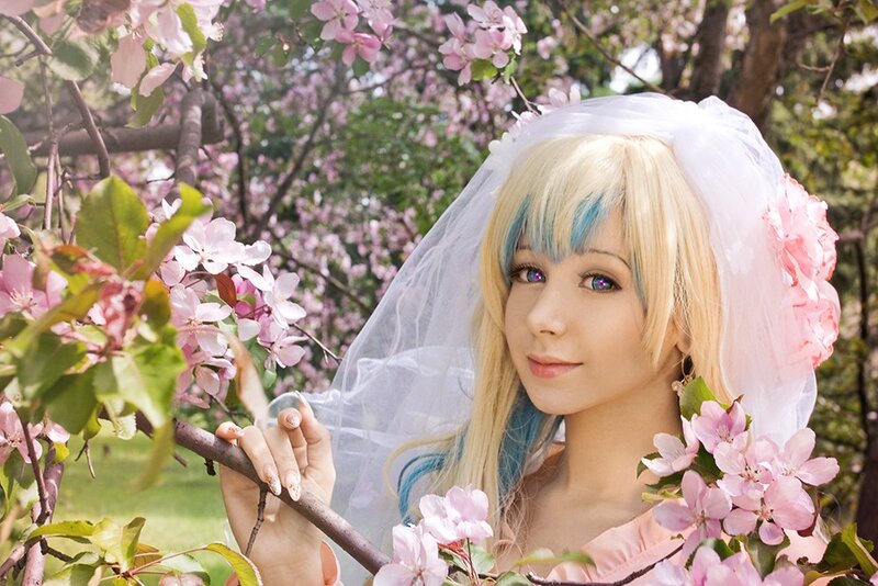 cosplayer in cherry blossoms