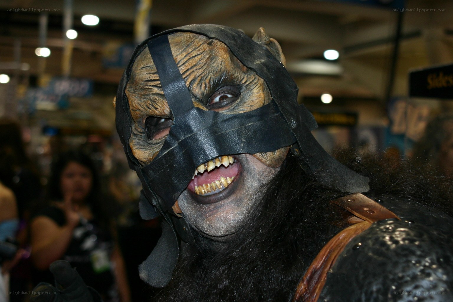 cosplayer in creature mask
