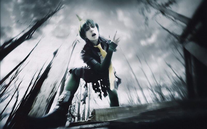 cosplayer in dark forest