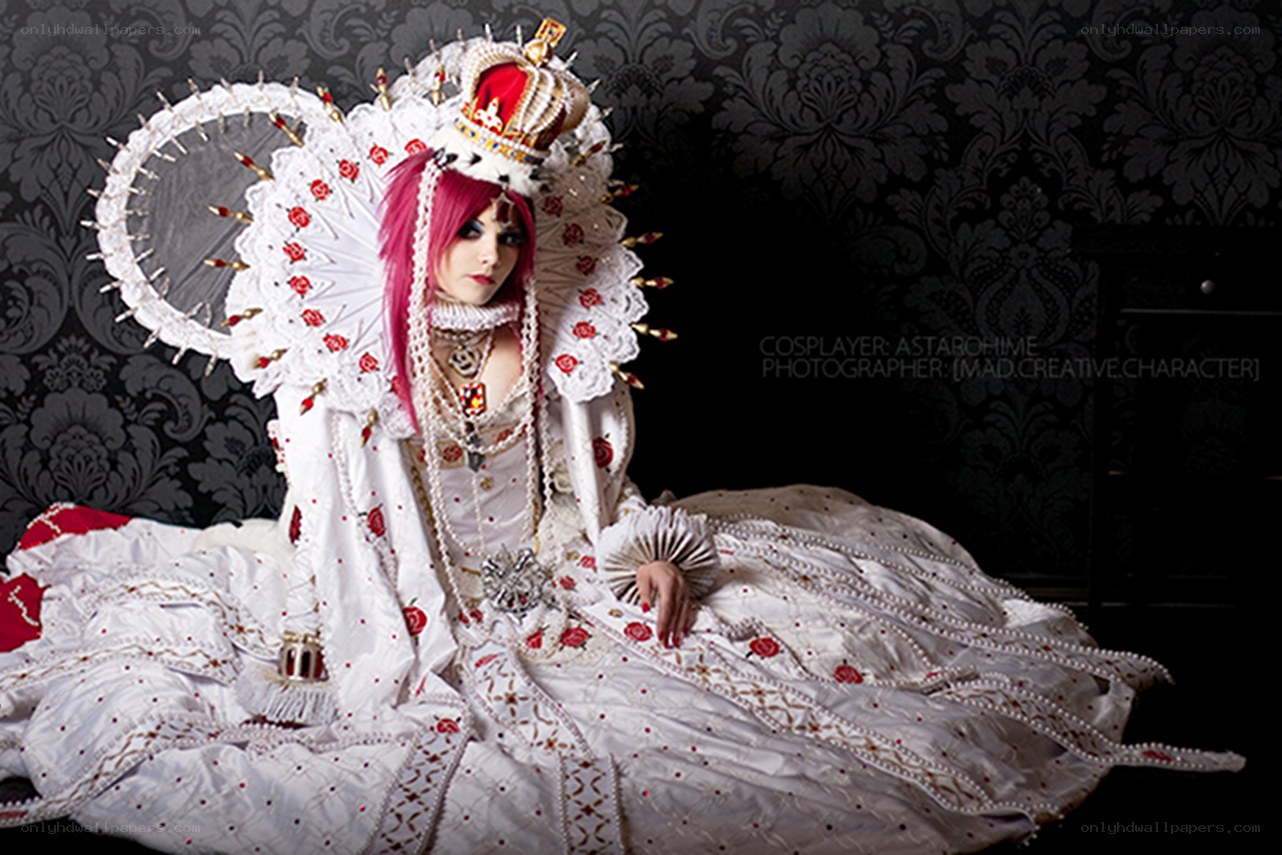 cosplayer in elaborate white costume