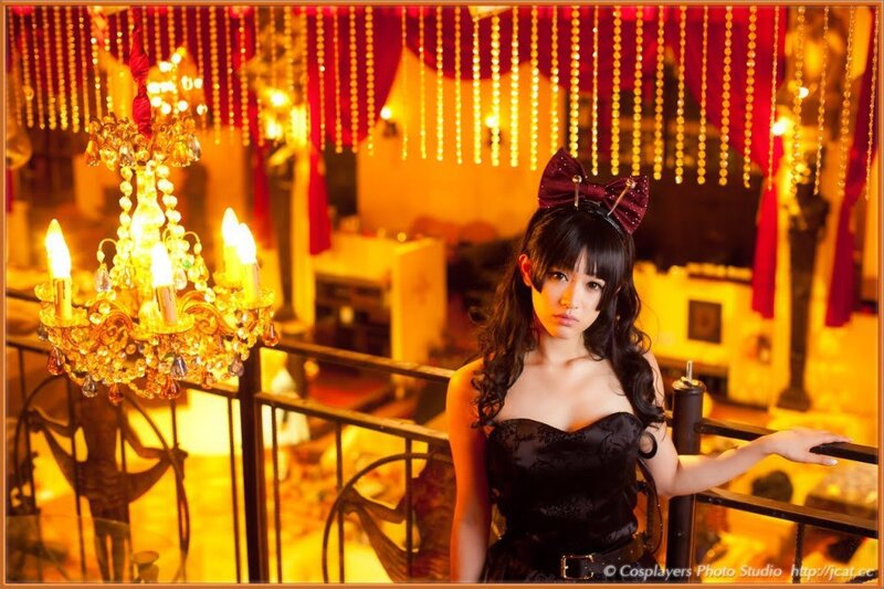 cosplayer in elegant black dress