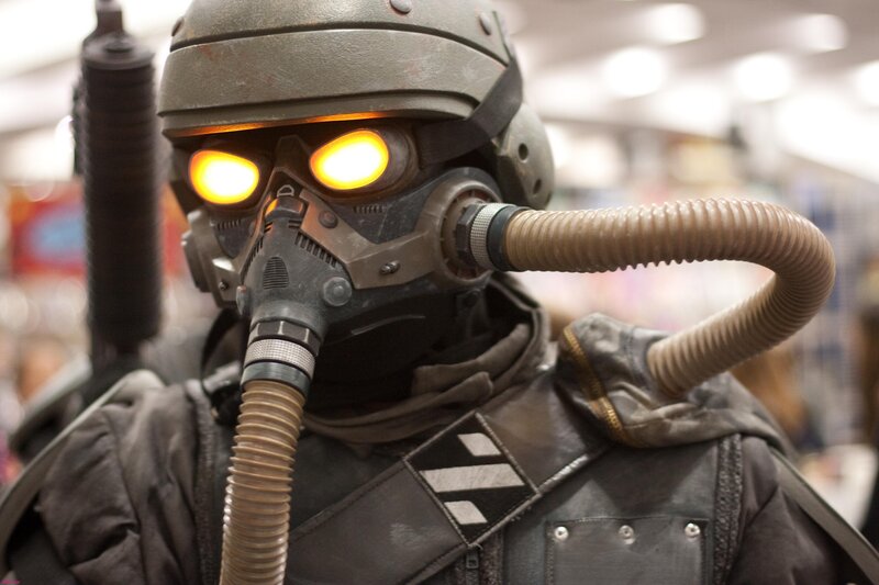 cosplayer in futuristic helmet