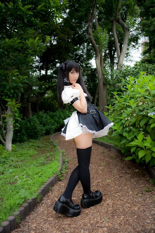cosplayer in garden path