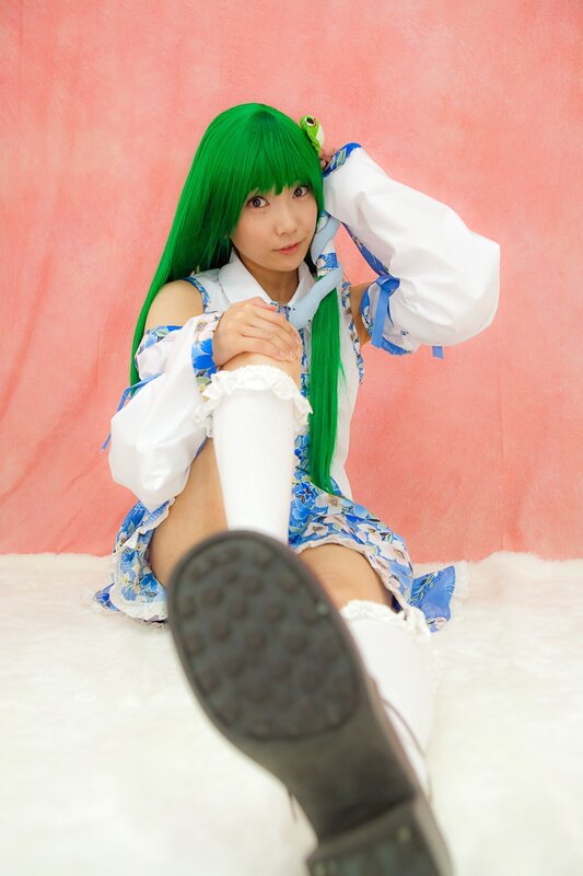 cosplayer in green wig and floral dress