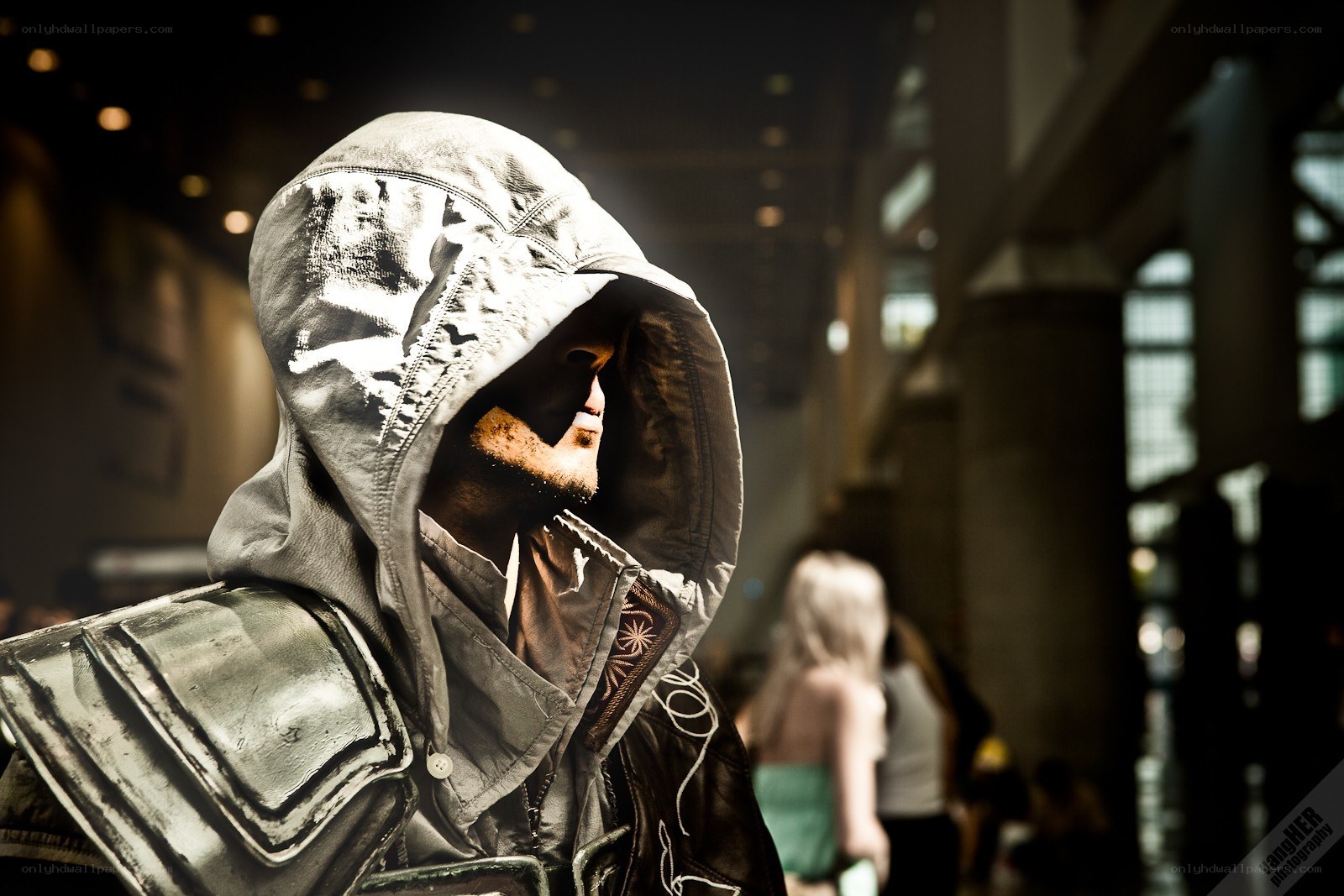 cosplayer in hooded costume