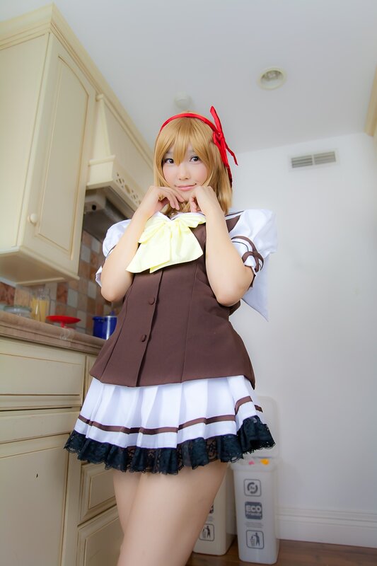 cosplayer in kitchen costume