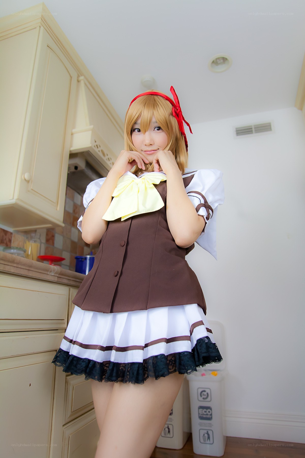 cosplayer in kitchen costume
