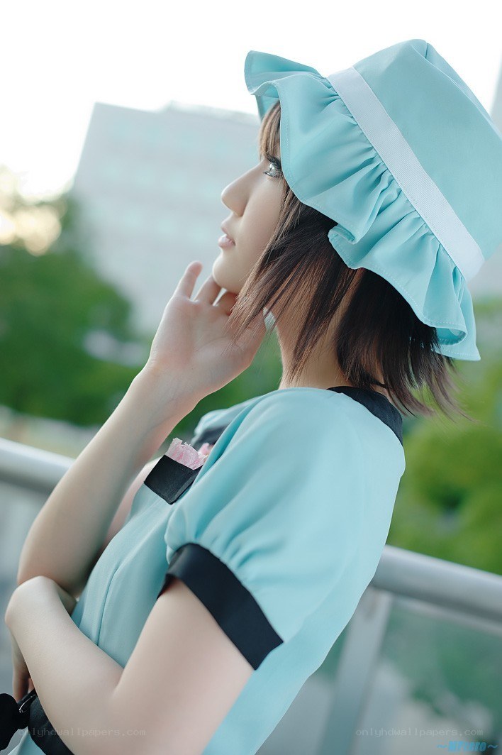 cosplayer in light blue dress