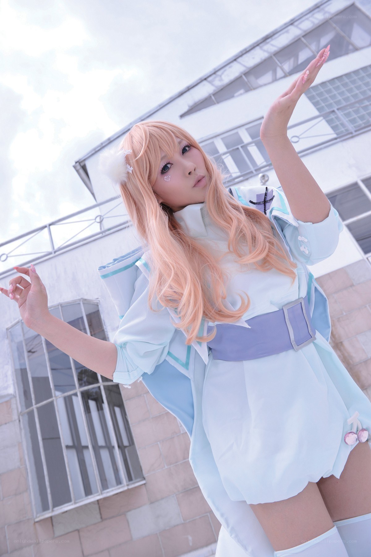cosplayer in light blue outfit