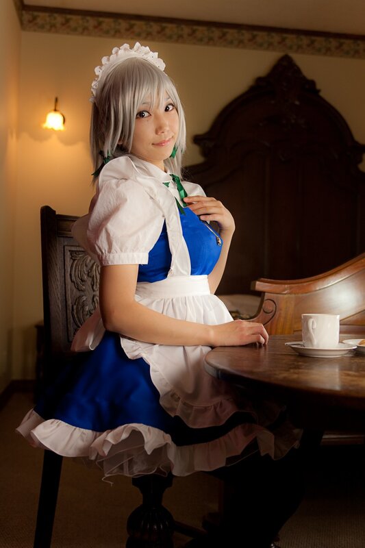 cosplayer in maid outfit