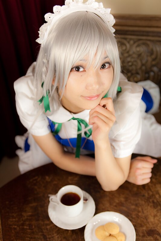 cosplayer in maid outfit
