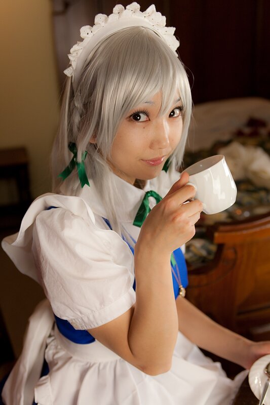 cosplayer in maid outfit