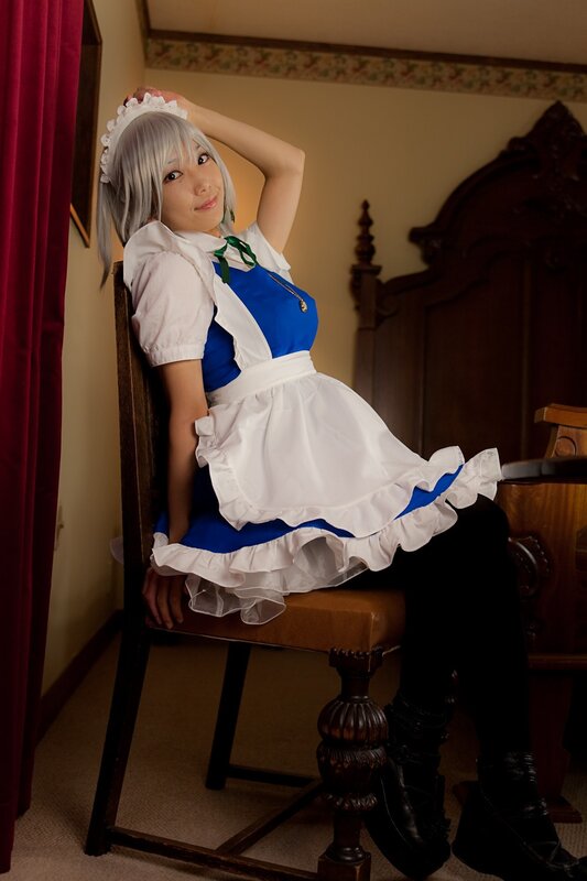 cosplayer in maid outfit