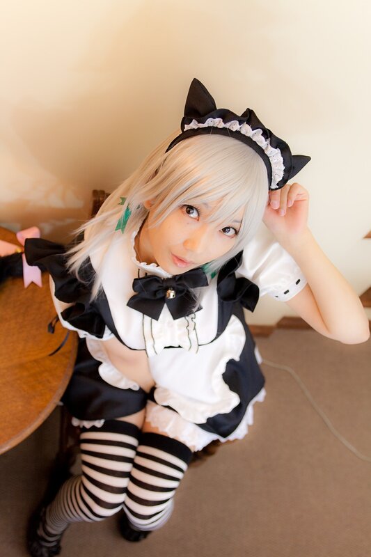 cosplayer in maid outfit