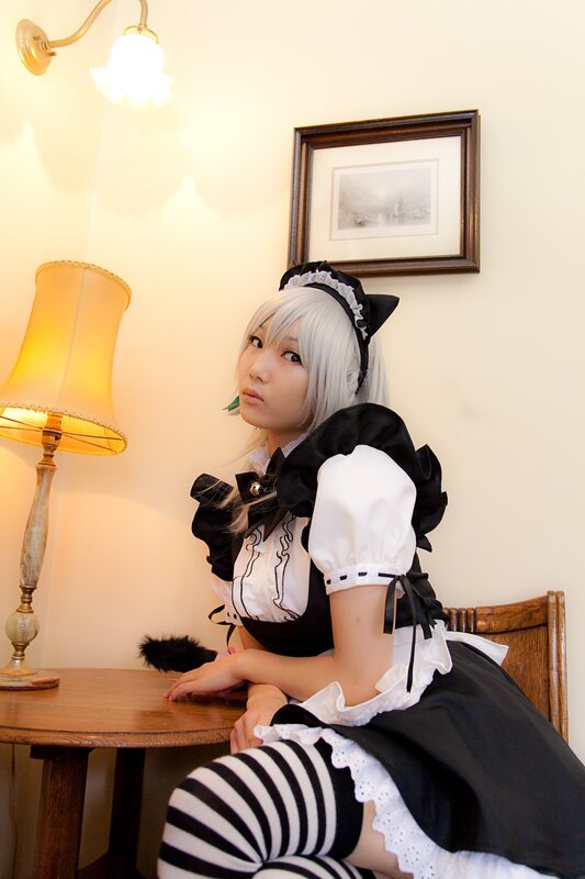 cosplayer in maid outfit
